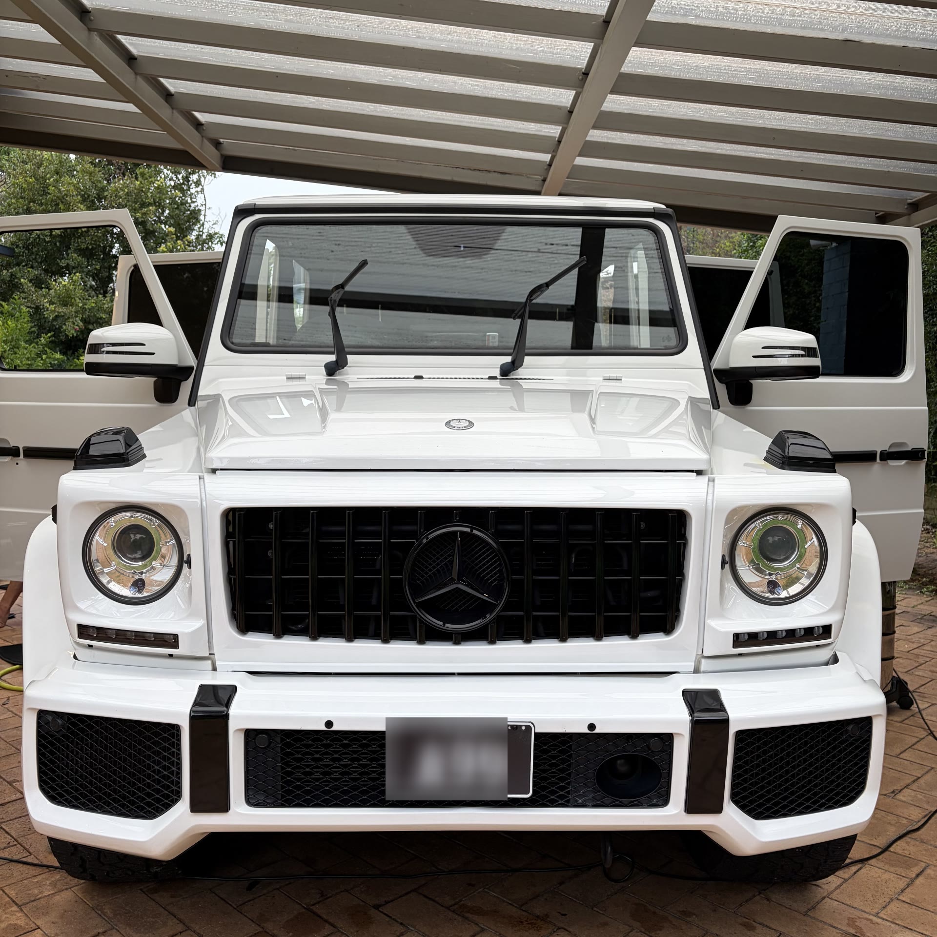White Mercedes-Benz G-Wagon exterior after detailing