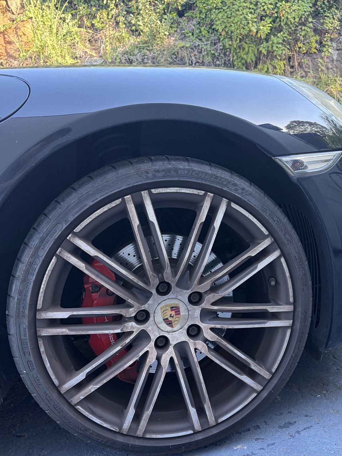 Porsche wheel before detailing