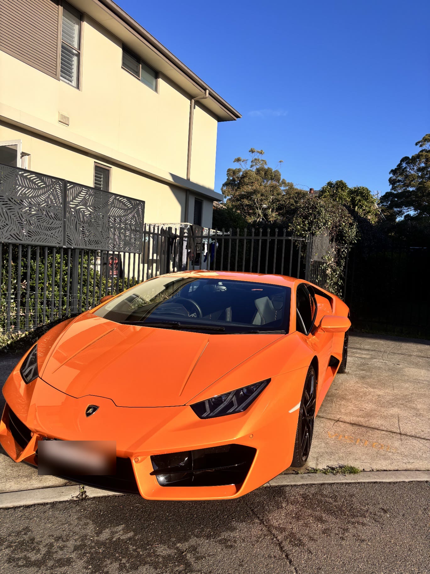Orange Lamborghini Huracán exterior after detailing